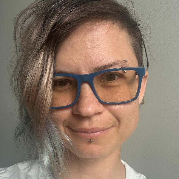 Self photo A photo of an enby wearing glasses